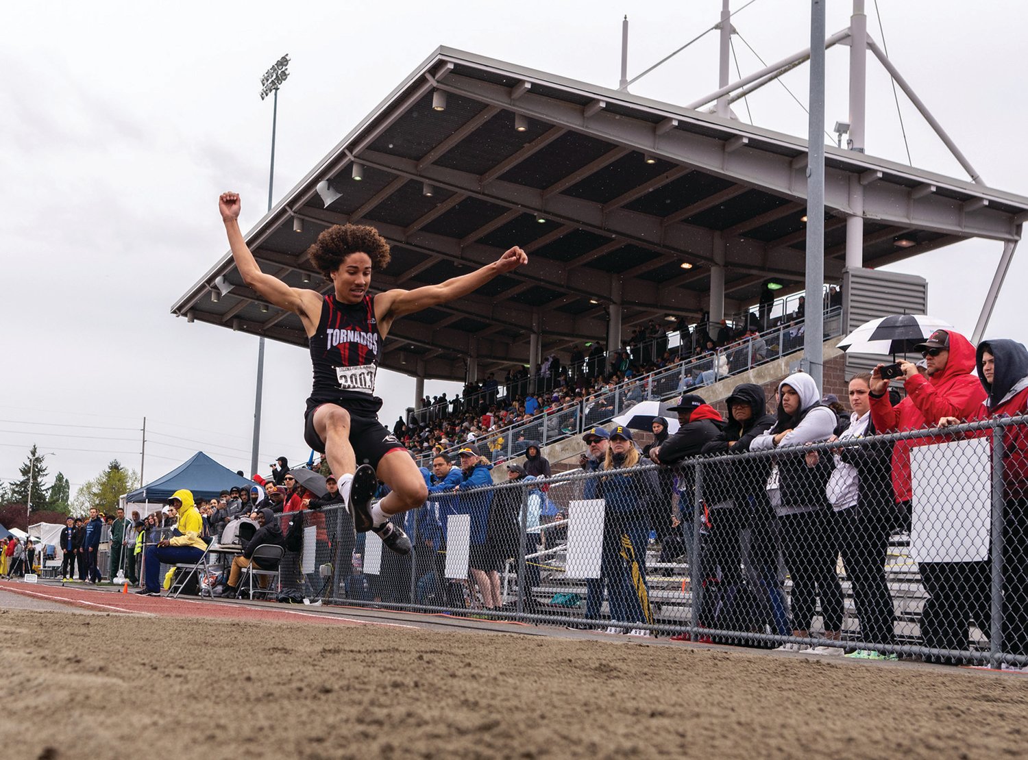 Yelm's Trevontay Smith leaps in the 3A Boys Triple Jump at the 4A/3A/2A State Track and Field Championships on Saturday, May 28, 2022, at Mount Tahoma High School in Tacoma.